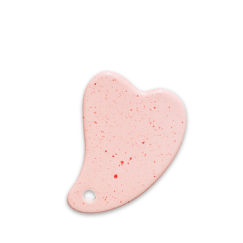 Różowy kamień gua sha